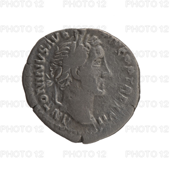 Denarius of Antoninus Pius (86–161; Roman emperor 138–161). Obverse: Head of Antoninus Pius in a laurel wreath facing right, inscription ANTONINVS AVG - PIVS PP TR P XVIII. Reverse: Annona standing left, holding ears of corn in her right hand and resting her left on a container (modius) standing on a ship, inscription C OS - IIII. Date: 154–155. Culture/place: Roman Empire, Rome. Medium: coin. Dimensions: diameters 17.5 mm and 19.5 mm; weight 3.27 g; axis 0°. Subjects/themes: Annona (personification), ears of corn, personifications, modius, ships; iconography: head of the emperor in a laurel wreath.