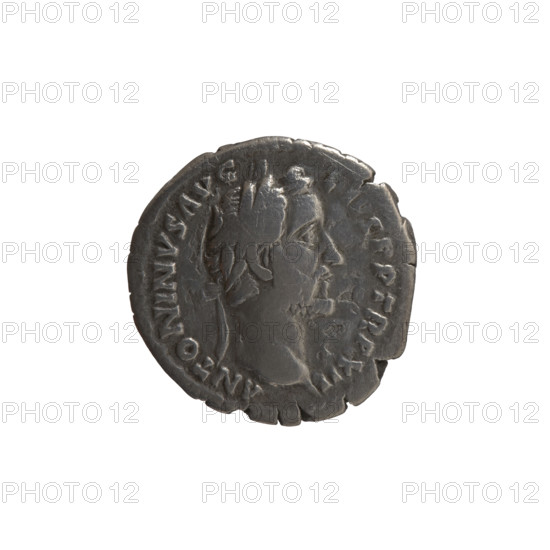 Denarius, Antoninus Pius (86–161; Roman emperor 138–161), issued 148–149. Obverse: Head of Antoninus Pius in a laurel wreath facing right, legend ANTONINVS AVG - PIVS PP TR P XII. Reverse: Naked Genius stands frontally with head turned left, holding a patera in his right hand and ears of corn in his left, legend C OS - IIII. Roman Empire (27 BC–476), Rome. Coin; diameter 17.5–18.0 mm, weight 2.95 g, axis 0°.