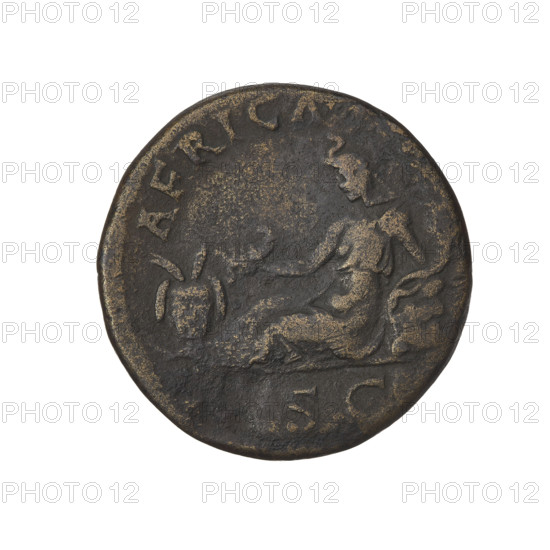Hadrian (76–138; Roman emperor 117–138). Obverse: head of Hadrian in laurel wreath facing right; rim inscription: HADRIANVSAVGCOSIIIPP. Reverse: Africa personified sitting on a rock facing left, wearing a long dress with an elephant-shaped headdress, holding a scorpion in her right hand, resting her left hand on a rock and holding a cornucopia; in front of her is a basket of fruit; rim inscription: obliterated; on both sides of the figure the letters SC. Date: 134–138, Rome, Roman Empire (27 BC–476). Coin; weight 10.40 g.