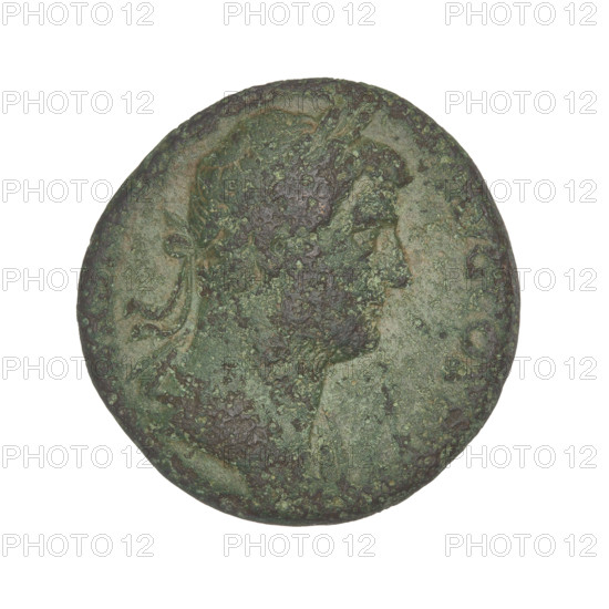 Hadrian (76–138; Roman emperor 117–138). Coin (119–138, Rome, Roman Empire). Obverse: head of Hadrian in laurel wreath facing right; rim inscription obliterated. Reverse: personification of Egypt seated on a rock facing left, wearing a long dress, holding a sistrum in her right hand with her left hand resting on a rock; an ibis stands on a column in front of her; rim inscription obliterated. Section letters: SC. Weight 12.10 g.