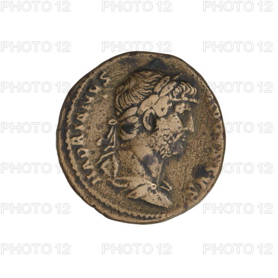 Hadrian (76–138; Roman emperor 117–138). Obverse: Bust of Hadrian with laurel wreath facing right; rim inscription 'HADRIANVS AVGVSTVS'. Reverse: Roma seated left, wearing a long robe and helmet, holding spears in her left hand and a figure of Victoria on her outstretched right arm; rim inscription 'COS IIII PP'; mintmark 'SC'. Date: 119–138. Rome, Roman Empire (27 BC–476). Coin; weight 9.20 g.