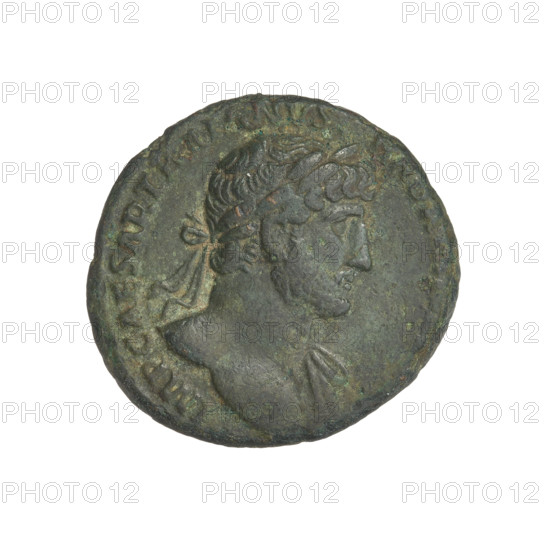 Hadrian (76–138; Roman emperor 117–138); cornucopia (iconographic); busts; laurel wreaths; Virtus (personification). Obverse: Bust of Hadrian with laurel wreath facing right; rim inscription: IMPCAESARTRAIANHA. Reverse: Virtus standing right, wearing a waist-length tunic, holding a vertical spear in his right hand and a cornucopia in his left; rim inscription: PONTMAX TR POT COS III; on the sides: SC. Date: 119–138. Place: Rome, Roman Empire (27 BC–476). Object: coin; weight: 9.65 g.