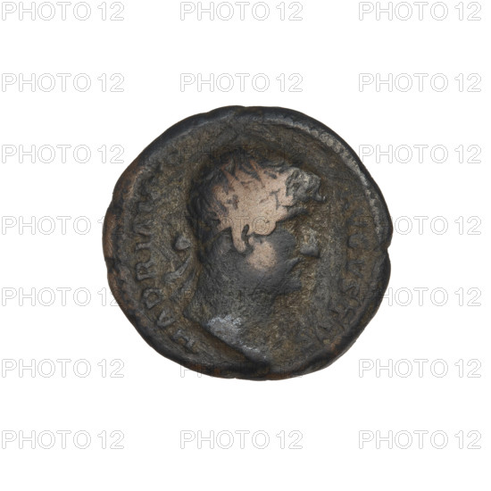 Quarter coin of Hadrian (76–138), Roman emperor (reigned 117–138). Obverse: bust of Hadrian facing right wearing a laurel wreath; rim inscription 'HADRIANVS AVGVSTVS'. Reverse: standing modius (grain-measuring vessel) with two ears of corn emerging to the right, left, and upwards; rim inscription 'COS III'. Dated 119–138 CE, Rome, Roman Empire (27 BCE–476 CE). Coin; weight 3.08 g.