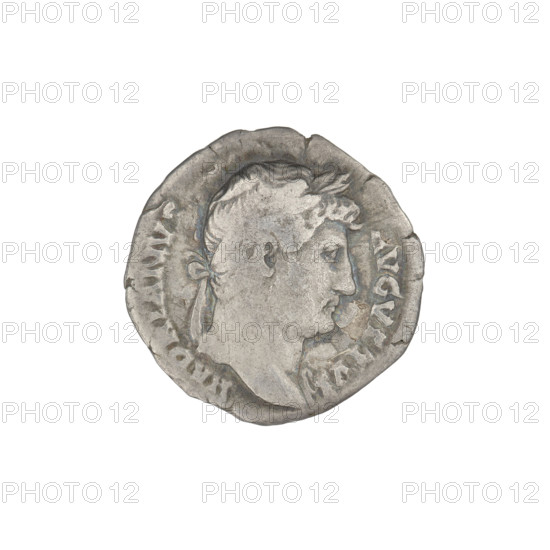 Denarius, Hadrian (76–138; Roman emperor 117–138). Obverse: head of Hadrian in laurel wreath facing right; rim inscription HADRIANVSAVGVSTVS. Reverse: Abundantia seated left, wearing a long robe, holding a hook in her right outstretched hand and a cornucopia in her left, with a modius standing in front of her; rim inscription COSIII; in the field a dot/globe. 125–128, Rome, Roman Empire (27 BC–476). Coin; weight 2.88 g.