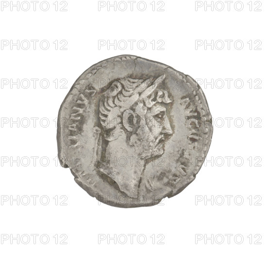 Denarius, Hadrian (76–138; Roman emperor 117–138). Obverse: head of Hadrian in laurel wreath facing right; rim inscription HADRIANVS AVGVSTVS. Reverse: Concordia seated left, dressed in a long robe, holding a patera in her outstretched right hand, with her left hand resting on the figure of Spes on a small base at the back of the chair; rim inscription COS III. Dated 125–128, Rome, Roman Empire (27 BC–476). Coin; weight 3.00 g.