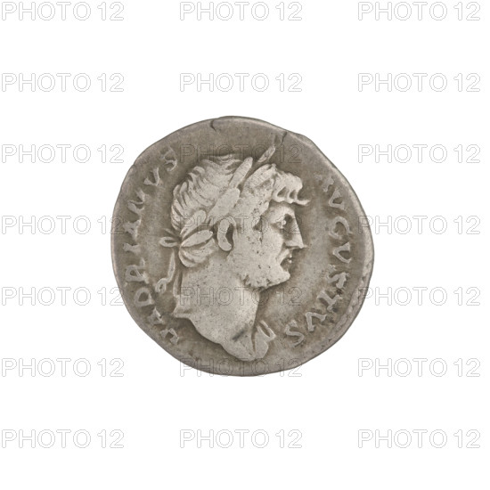 Denarius, Hadrian (76–138; Roman emperor 117–138). Obverse: head of Hadrian in laurel wreath facing right; rim inscription HADRIANVS AVGVSTVS. Reverse: Concordia seated left, dressed in a long robe, holding a patera in her outstretched right hand, with her left hand resting on the figure of Spes on a small base at the back of the chair; rim inscription COS III. Date: 125–128. Rome, Roman Empire (27 BC–476). Coin; weight 3.17 g.