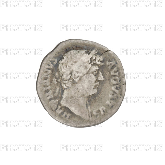 Denarius of Hadrian (76–138; Roman emperor 117–138). Obverse: head of Hadrian in laurel wreath facing right; rim inscription HADRIANVS AVGVSTVS. Reverse: Genius standing left, dressed in waist-length robe, holding a patera over an altar in his right hand and a cornucopia in his left; rim inscription COS III. Date: 125–128. Rome, Roman Empire (27 BC–476). Coin; weight 2.62 g.