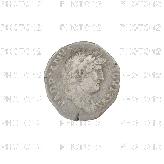 Denarius, Hadrian (76–138; Roman emperor 117–138); obverse: head of Hadrian in laurel wreath facing right; rim inscription HADRIANVS AVGVSTVS. Reverse: Hercules seated naked on armour facing right, right hand resting a club on a round shield, left hand holding a figure of Victoria; a helmet lies behind him; rim inscription COS. Date: 125–128 CE, Rome; Roman coin; weight 3.60 g.