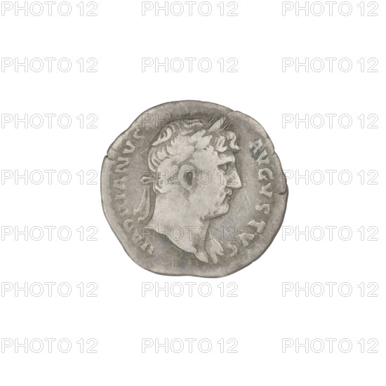 denarius; Hadrian (76–138; Roman emperor 117–138); Hercules (mythology); laurel wreaths; clubs; heads. Obverse: head of Hadrian in laurel wreath facing right; rim inscription: HADRIANVS AVGVSTVS. Reverse: Hercules seated naked facing right on armor; in his right hand he holds a club resting on a round and oval shield; in his left hand he holds a figure of Victoria; rim inscription: COS III. Date: 125–128. Rome, Roman Empire (27 BC–476). Coin; weight 3.00 g.