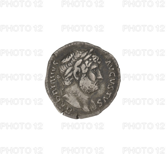 Denarius, Hadrian (76–138; Roman emperor 117–138). Obverse: head of Hadrian with laurel wreath facing right; rim inscription 'HADRIANVS AVGVSTVS.' Reverse: Pudicitia (personification) standing left, wearing a long dress and veil, holding the veil with her right hand, left arm along the body; rim inscription 'COS III.' 125–128 CE, Rome, Roman Empire (27 BCE–476 CE). Coin; weight 3.18 g.