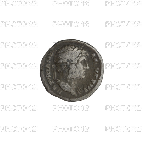 Denarius of Hadrian (76–138; Roman emperor 117–138). Obverse: head of Hadrian in laurel wreath facing right; rim inscription HADRIANVS AVGVSTVS. Reverse: Roma standing right, wearing a short robe and helmet, spear in right hand, parazonium in left, left foot on globe/helmet; rim inscription COS III. 125–128 CE, Rome. Coin, weight 3.01 g.