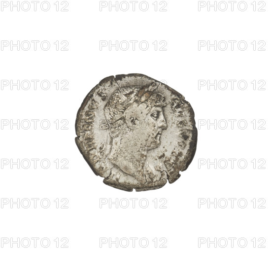 Denarius of Hadrian (76–138; Roman emperor 117–138). Obverse: head of Hadrian in laurel wreath facing right; rim inscription HADRIANVS AVGVSTVS. Reverse: Roma standing left, wearing a short robe and helmet; in her right hand a figure of Victoria, in her left a spear; rim inscription COS. Date: 125–128 CE. Rome, Roman Empire. Coin; weight 3.15 g.