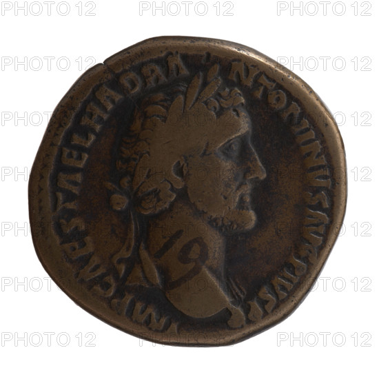 Sestertius, Antoninus Pius (86–161; Roman emperor 138–161) — obverse: head of the emperor in a laurel wreath and drapery on the left shoulder facing right, inscription IMP CAES T AEL HADR A - NTONINVS AVG PIVS PP; reverse: Annona (personification) seated left, holding ears of corn in her right hand over a container with grain (modius) and a horn of plenty in her left, inscriptions TR POT X, - C, and ANONNA AV in section, field marks S - C; dated 150–151; Roman Empire (27 BC–476), Rome; coin (sestertius); diameter 32.0–32.5 mm; weight 27.05 g; axis 180°.