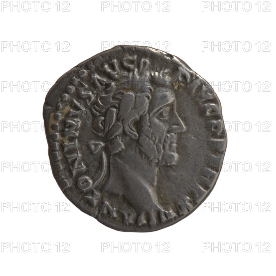Denarius of Antoninus Pius (86–161; Roman emperor 138–161). Obverse: Head of Antoninus Pius in a laurel wreath facing right, inscription ANTONINVS AVG - PIVS PP TR P XVII. Reverse: Annona (personification) standing left, holding ears of corn in her right hand and resting her left on a container (modius) standing on a ship, inscription C OS - IIII. Iconography: Annona, ears of corn, personifications; head of the emperor in a laurel wreath, modius, ships. Date: 153–154. Culture/place: Roman Empire, Rome. Object type/material: coin (denarius). Measurements: diameter 17.0–17.5 mm, weight 3.05 g, axis 180°.