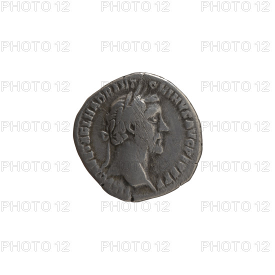 Denarius, Antoninus Pius (86–161; Roman emperor 138–161) — obverse: head of the emperor in a laurel wreath facing right, legend IMP CAES T AEL HADR ANTONINVS AVG PIVS PP; reverse: Annona (personification) stands left, holds ears of corn in her right hand and rests her left on a modius (grain-measure) standing on a ship, legend TR POT XV — COS IIII; date c. 151–152, Rome, Roman Empire; coin; diameter 17.0–18.0 mm; weight 3.17 g; axis 195°.