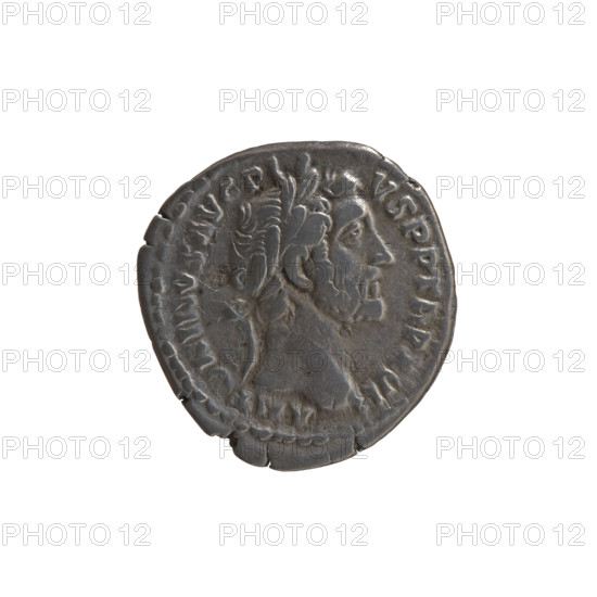 Denarius of Antoninus Pius (reign 138–161), struck 152–153. Obverse: head of the emperor in a laurel wreath facing right, legend ANTONINVS AVG PI - VS PP TR P XVI. Reverse: Annona standing left, holding ears of corn in her right hand and resting her left on a container (modius) standing on a ship, legend COS - IIII. Iconography includes Annona, ears of corn, modius, and ships. Roman coin; diameter 17.5 mm, weight 3.00 g, axis 180°.