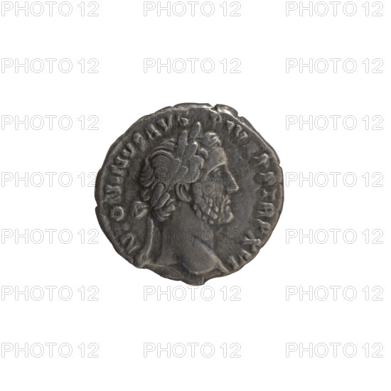 Denarius, Antoninus Pius (86–161; Roman emperor 138–161) — issuer: Antoninus Pius. Obverse: head of the emperor in a laurel wreath facing right, legend ANTONINVS AVG - PIV, PP TR P XVI. Reverse: Annona (personification) stands left, holds ears of corn in her right hand, rests her left on a container (modius) standing on a ship, legend COS - I III. Iconography: Annona, ears of corn, personifications, head of the emperor in a laurel wreath, modius, ships. Date: 152–153. Culture/place: Roman Empire, Rome. Object type/material: coin (denarius). Dimensions: diameter 16.5–17.0 mm, weight 2.50 g, axis 165°.