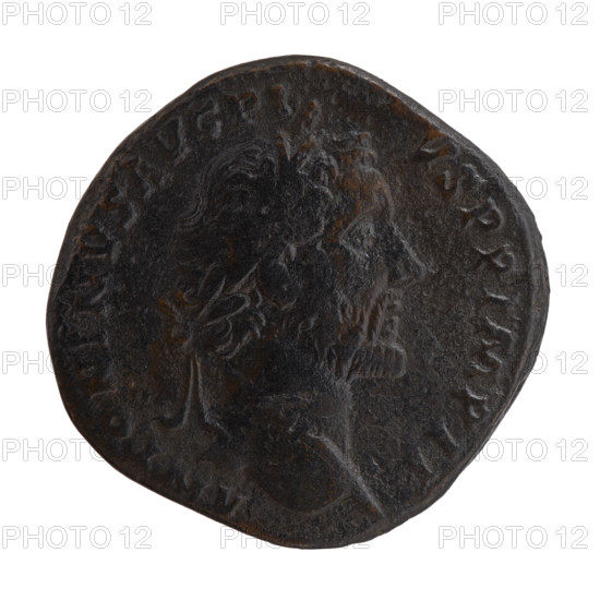 Sestertius, Antoninus Pius (86–161; Roman emperor 138–161), issuer: Antoninus Pius. Obverse: head of the emperor in a laurel wreath to the right; legend ANTONINVS AVG PIVS PP IMP II. Reverse: Annona (personification) stands to the right with one leg on the prow of a ship, holding a long rudder in her right hand and a modius (container with ears of grain) in her left; legend TR POT XX COS IIII; S C in fields. Date: 156–157. Roman Empire (27 BC–476), Rome. Coin (sestertius): diameter c. 30–31 mm, weight 24.99 g, axis 0°.
