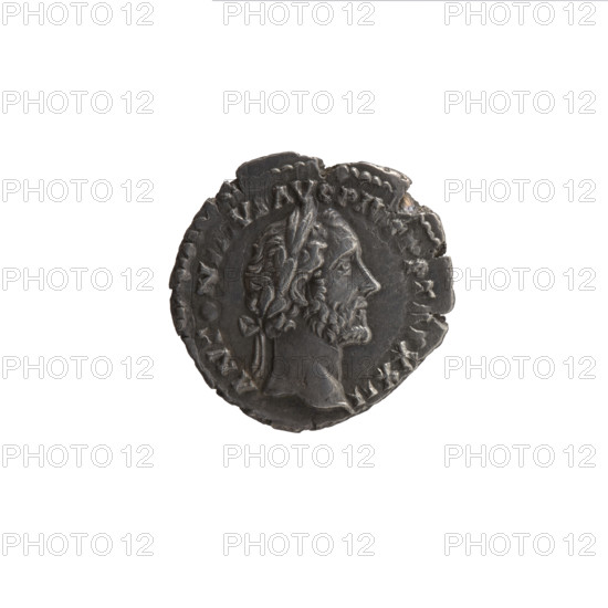 Denarius, Antoninus Pius (86–161; Roman emperor 138–161), issuer: Antoninus Pius. Obverse: head of Antoninus Pius with a laurel wreath facing right, inscription ANT N VS AVG PI P TR XXII. Reverse: emperor in toga and veil standing left, holding a patera above a tripod in his right hand and a scroll in his left, inscription V A VSCE PTA D I; episode COS IIII (158–159). Roman Empire (27 BC–476), Rome. Coin: diameter 16.5–18.0 mm, weight 3.20 g, axis 180°.