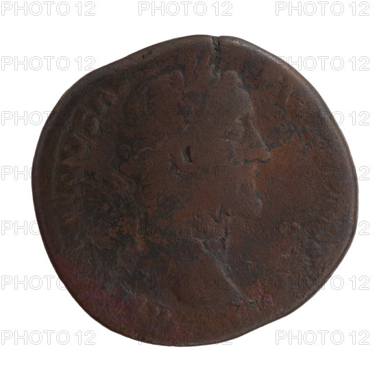 Sestertius of Antoninus Pius (86–161; Roman emperor 138–161). Obverse: Head of the emperor with a laurel wreath to the right, legend 'ANTONINVS AVG - PIVS PP'. Reverse: Emperor in toga and veil standing left, holding a patera above a tripod in his right hand and a scroll in his left, with legends 'VO, DEC III' and 'COS IIII' in a section. Iconography: emperor with veil, tripods, paterae. Date: 158–159. Roman Empire, mint: Rome. Coin type: sestertius; diameter 29.5–31.0 mm; weight 22.50 g; axis 180°.