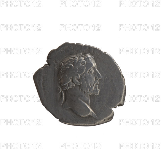 Denarius, Antoninus Pius (86–161; Roman emperor 138–161), issuer. Obverse: Head of Antoninus Pius in a laurel wreath facing right, inscription 'ANTONINVS PIVS' (abbreviated), VG - PIVS P, XVIII all around. Reverse: Annona (personification) stands left, holds ears of corn in her right hand, rests her left on a container (modius) standing on a ship, C O, III all around. Iconography: ears of corn, Annona, head of the emperor in a laurel wreath, personifications, modius, ships. Date: 154–155. Culture/place: Roman Empire, Rome. Object type: coin. Measurements: diameter 16.5–18.5 mm, weight 3.02 g, axis 180 degrees.