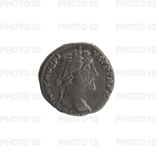 Denarius, Antoninus Pius (86–161; Roman emperor 138–161), issuer: Antoninus Pius. Obverse: Head of Antoninus Pius in a laurel wreath facing right, inscription ONINVS AVG PI - VS PP TR P XVIII. Reverse: Annona (personification) stands left, holds ears of corn in her right hand, rests her left on a container (modius) standing on a ship, inscription C OS - IIII. Date: 154–155. Culture: Roman Empire. Place: Rome. Medium: silver coin. Diameter: 16.5 mm. Weight: 2.95 g. Axis: 180 degrees.