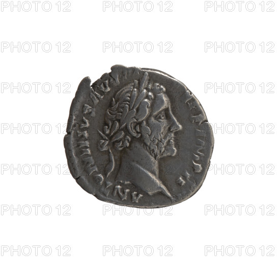 Denarius, Antoninus Pius (86–161; Roman emperor 138–161), issuer: Antoninus Pius. Obverse: Head of Antoninus Pius in a laurel wreath facing right, legend 'ANTONINVS AV - S PP IMP II'. Reverse: Annona (personification) seated right, holding a horn of plenty in both hands; in front of her is a container with ears of grain (modius); legend 'TR POT XX - COS IIII'. Date: 156–157. Culture: Roman Empire. Place: Rome. Object type: coin. Material: (denarius). Diameter: 16.0 mm. Weight: 3.50 g. Axis: 210 degrees.