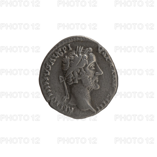 Denarius (hybrid) of Antoninus Pius (86–161; Roman emperor 138–161), after 155–157. Obverse: Head of Antoninus Pius in a laurel wreath to the right, legend ANTONINVS AVG PI - VS PP TRP XIIII. Reverse: Annona (personification) seated to the right, holding a cornucopia in both hands; in front of her on the ground a modius with ears of corn, legend TR PO, - COS IIII. Iconography: ears of cornucopia, Annona, personifications, horns of plenty. Roman Empire (27 BC–476), Rome. Coin; diameter 16.5–17.5 mm, weight 2.25 g, axis 180°.