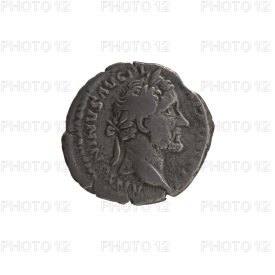 Denarius, Antoninus Pius (86–161; Roman emperor 138–161). Obverse: head of the emperor in a laurel wreath facing right, inscription ANTONINVS AVG PI - PP IMP II. Reverse: Annona (personification) seated right, holding a horn of plenty in both hands; in front of her a modius (container with ears of grain), inscription TR POT XX - COS IIII. Date: 156–157. Roman Empire. Rome. Coin. Diameter 17.0–17.5 mm. Weight 2.80 g. Axis 180°.