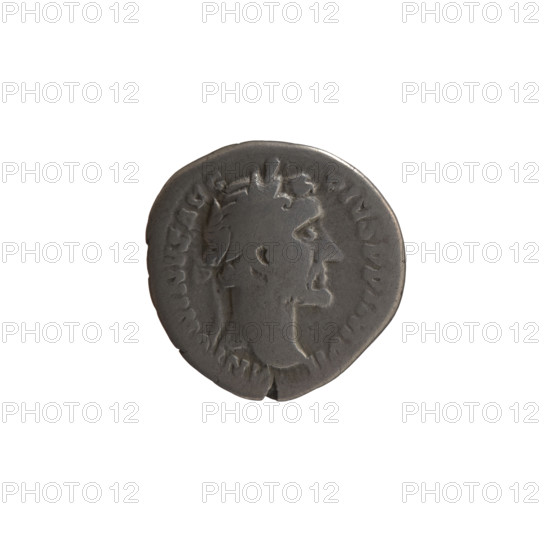 Denarius of Antoninus Pius (reigned 138–161). Obverse: head of the emperor in a laurel wreath facing right, inscription ANTONINVS AVG - PIVS PP IMP II. Reverse: Annona seated right, holding a cornucopia in both hands; in front a modius (container with ears of grain); inscription POT XX -, S IIII. Dated 156–157. Roman Empire, Rome. Coin: diameter 17.5–18.0 mm, weight 2.95 g, axis 0°.