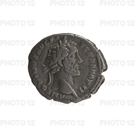 Denarius, Antoninus Pius (86–161; Roman emperor 138–161), issuer: Antoninus Pius; subject: personification Annona; iconography: head of the emperor in a laurel wreath facing right with legend 'ANTONINVS AVG PI - VS PP IMP II' (obverse); Annona stands to the right with one leg on the prow of a ship, holding a long rudder resting on a globe in her right hand and a modius (container with ears of grain) in her left, with legend 'TR POT XX - COS IIII' (reverse); date: 156–157; culture/place: Roman Empire, Rome; object type: coin (denarius); dimensions: diameters 16.5 mm and 19.0 mm, weight 3.10 g; axis 180°.