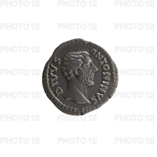 Denarius, posthumous for Antoninus Pius (86–161), issued under Lucius Verus (130–169) and Marcus Aurelius (121–180). Obverse: head of Antoninus Pius bare, right, inscription DIVVS ANTONINVS. Reverse: Antoninus Pius seated left, holding long scepter and branch, inscription DIV–O–IO. Roman Empire, after 161, Rome. Coin; diameter 18.5–18.9 mm, weight 3.50 g, axis 0°.