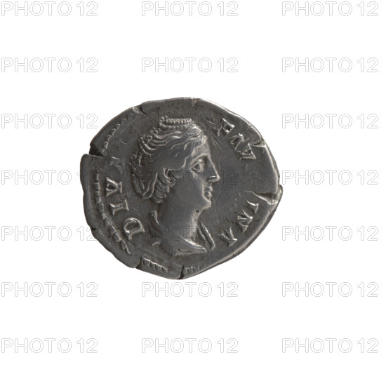 Denarius, posthumous issue for Faustina the Elder (98–141; Roman empress 138–141). Issuer: Antoninus Pius (86–161; Roman emperor 138–161). Obverse: Bust of Faustina I in drapery facing right, inscription DIV•FAV•INA around. Reverse: Ceres standing left, holding a long torch in her right hand and lifting the hem of her robe with her left, inscription VG•VSTA circumferential. After 141 CE, Roman Empire (Rome). Coin: dia. 18.0–20.5 mm, weight 3.10 g, axis 180°.