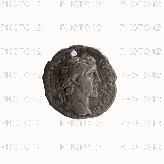 Denarius (with a hole), Antoninus Pius (86–161; Roman emperor 138–161), issuer; Marcus Aurelius (121–180; Roman emperor 161–180), caesar 139–161. Obverse: Head of Antoninus Pius in a laurel wreath to the right, inscription 'ANT AVG PIVS - PP TR, OS III' around. Reverse: Head of young Marcus Aurelius uncovered facing right, inscription 'AVRELI CAESAR - AVG PII F COS' around. ca. 140; Roman Empire (27 BC–476), Rome. Coin: diameter 16.0–16.5 mm; weight 2.42 g; axis 0°.