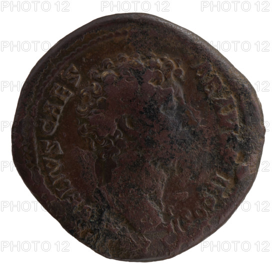 Sestertius of Marcus Aurelius (121–180), issued ca. 145–147; obverse: head of young Marcus Aurelius bare, right, legend RELIVS CAES - AR AVG P, COS II; reverse: Minerva walking right, right hand raised holding a spear poised to throw, left hand holding a round shield; fields marked S - C; iconography: Roman deities (Minerva), spears, shields; Roman Empire, Rome; coin; diameter 32.0–33.0 mm, weight 25.95 g, axis 0°.