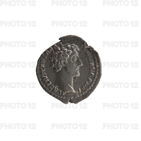 Denarius, Marcus Aurelius (121–180; Roman emperor 161–180), (caesar 139–161); issuer: Antoninus Pius (86–161; Roman emperor 138–161). Obverse: Head of young Marcus Aurelius without a cap to the right; legend 'AVRELIVS CAESAR AN T I AV PII FI' (all around). Reverse: Clementia stands frontally, head turned left, holding a patera in her right hand and lifting the hem of her robe with her left; legend 'TR POT III - COS I' with 'CLEM' in exergue. Date: 148–149. Roman Empire, Rome. Coin (denarius): silver; diameter 18.0 mm; weight 3.00 g; axis 195°.