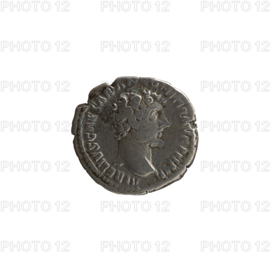 Denarius, Marcus Aurelius (121–180; Roman emperor 161–180), (caesar 139–161); issuer: Antoninus Pius (86–161; Roman emperor 138–161); Marcus Aurelius (heir to the throne; 138–161) — iconography: Antoninus Pius — iconography; personifications: Clementia. Obverse: Head of young Marcus Aurelius without a cap to the right, inscription 'AVRELIVS CAESAR AN[...], ONINI AVG PII FIL' all around. Reverse: Clementia stands frontally, head turned left, holds a patera in her right hand and with her left lifts the hem of her robe; inscriptions 'TR POT VI—CO[,] I' and 'CLEM' in field. Date: 151–152. Culture/period: Roman Empire (27 BC–476). Place: Rome. Object type: coin (denarius). Dimensions: diameter 16.5–18.0 mm; weight 3.50 g; axis 180°.
