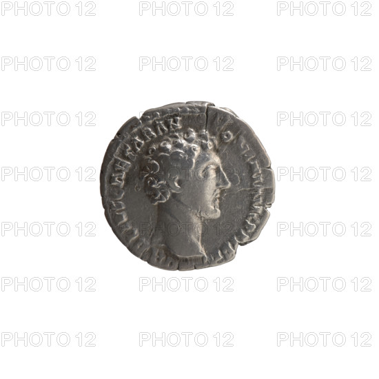Denarius, Marcus Aurelius (121–180; Roman emperor 161–180), caesar 139–161; Antoninus Pius (86–161; Roman emperor 138–161) — issuer. Iconography: Head of young Marcus Aurelius without a cap facing right; legend VRELIVS CAESAR ANTONINI AVG PII FIL around. Reverse: Clementia stands frontally, head turned left, holding a patera in her right hand and lifting the hem of her robe with her left; legend TR POT, I COS II around, CLEM in section. Date: ca. 151–152. Roman Empire (27 BC–476), Rome. Coin (denarius): diameters 17.0 mm and 19.0 mm, weight 3.15 g, axis 180°.