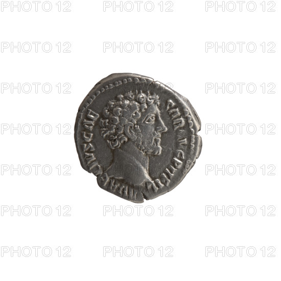 Denarius, Marcus Aurelius (121–180; Roman emperor 161–180), ca. 139–161 as caesar; issuer: Antoninus Pius (86–161; Roman emperor 138–161); iconography: head of young Marcus Aurelius right, uncovered, legend AVRELIVS CAE SAR VG PII FIL all around; reverse: Genius (Genius Exercitus) standing left, holding a patera above an altar in his right hand and a legionary standard in his left, legend TR POT VII COS II all around. Date: 152–153. Roman Empire, Rome. Coin: silver denarius; diameter 18.0 mm; weight 2.90 g; axis 0°.