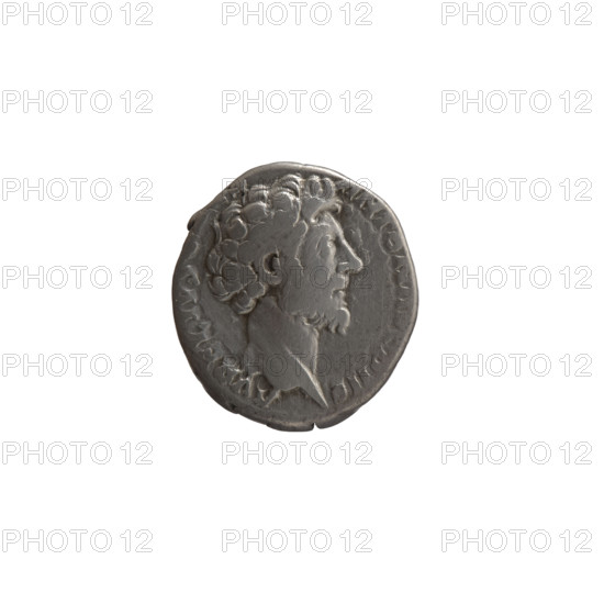 Denarius, Marcus Aurelius (121–180; Roman emperor 161–180), caesar 139–161; Antoninus Pius (86–161; Roman emperor 138–161) — issuer; iconography: personifications, parazonium (attribute). Obverse: Head of young Marcus Aurelius without a cap to the right, inscription “AVRELIVS ANTON AVG PII F” all around. Reverse: Virtus standing left, holding a parade dagger (parazonium) in his right hand and a spear with the head down in his left, inscription “TR P X COS II” all around. Date: 155–156. Culture/place: Roman Empire, Rome. Object type: coin (denarius). Dimensions: diameter 16.0–17.5 mm; weight 3.60 g; axis 0°.