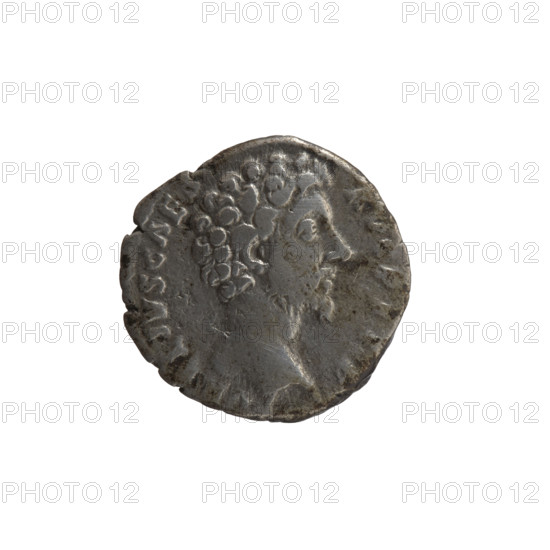 Denarius, Marcus Aurelius (121–180; Roman emperor 161–180), caesar 139–161; issuer: Antoninus Pius (86–161; Roman emperor 138–161). Obverse: Head of Marcus Aurelius without a cap to the right, inscription VRELIVS CAES – AVG PII F all around. Reverse: Virtus stands right with his left foot on a lying helmet, holding a spear with the head down in his right hand and a parade dagger (parazonium) in his left; inscription TR POT XIII – COS II all around. Date: 158–159. Roman Empire, Rome. Coin: diameter 17.0–17.5 mm, weight 3.22 g, axis 180°.