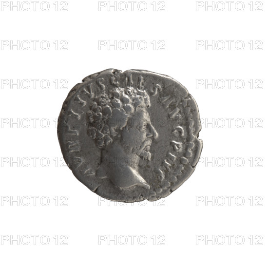 Denarius, Marcus Aurelius (121–180; Roman emperor 161–180), circa 159–160. Obverse: Head of Marcus Aurelius without a cap to the right, inscription 'AVRELIVS CAES AVG PII F'. Reverse: Minerva walking right, holding a spear in her raised right hand and a shield visible at center in her left; inscription 'TR POT XIIII - COS II'. Subject: Roman deities (Minerva). Materials/style: Roman coin. Dimensions: diameters 16.0 mm and 17.5 mm, weight 3.22 g, axis 180°. Place: Rome, Roman Empire (27 BC–476).