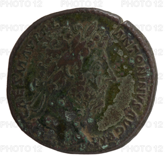 Sestertius, Marcus Aurelius (121–180; Roman emperor 161–180), issuer. Obverse: head of Marcus Aurelius with laurel wreath facing right, inscription 'P CAES M AVREL - ANTONINVS AVG', mint mark 'M' all around. Reverse: Salus stands left; in her right hand she holds a patera from which she feeds a snake wrapped around an altar, in her left hand a scepter; inscription 'SALVTI AVGVSTOR TR P XVII, in the COS III' and 'SC'. Date: 162–163 CE. Roman Empire, Rome. Coin; diameter 31.0–32.0 mm, weight 22.70 g, axis 345°.