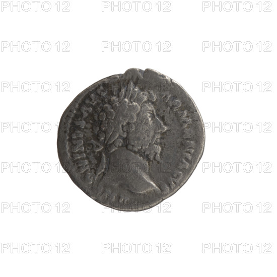Denarius of Marcus Aurelius (121–180; Roman emperor 161–180). Obverse: Head of Marcus Aurelius with laurel wreath to the right, inscription NTONINVS AVG - ARMENIACVS. Reverse: Personification of Armenia in a short robe, trousers and pointed cap, seated left; in front of her a shield and a standard (vexillum); she supports her head with her right hand and rests her left on a bow and quiver; inscription PM TR P XVIII IMP II COS III and episode legend ARMEN. Date: 163–164. Rome, Roman Empire (27 BC–476). Coin; diameter 16.5–17.5 mm; weight 2.90 g; axis 30°.