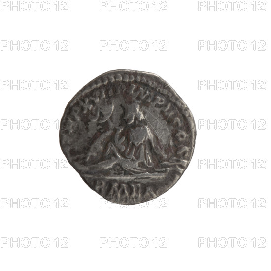 Denarius of Marcus Aurelius (121–180; emperor 161–180). Obverse: head of Marcus Aurelius with laurel wreath facing right, inscription ANTONINVS AV. Reverse: personification of Armenia in a short robe, trousers and a pointed cap seated left, supporting her head with her right hand, left hand resting on a bow and a quiver, with a shield and a standard (vexillum) before her, inscriptions TR P XVII, IMP II COS II, RMEN; scene dated 163–164. Iconography includes Armenia, bows, quivers, shields, vexillum; Marcus Aurelius - iconography. Roman Empire, Rome. Coin: silver denarius, diameter 16.5 mm, weight 3.00 g, axis 0°.