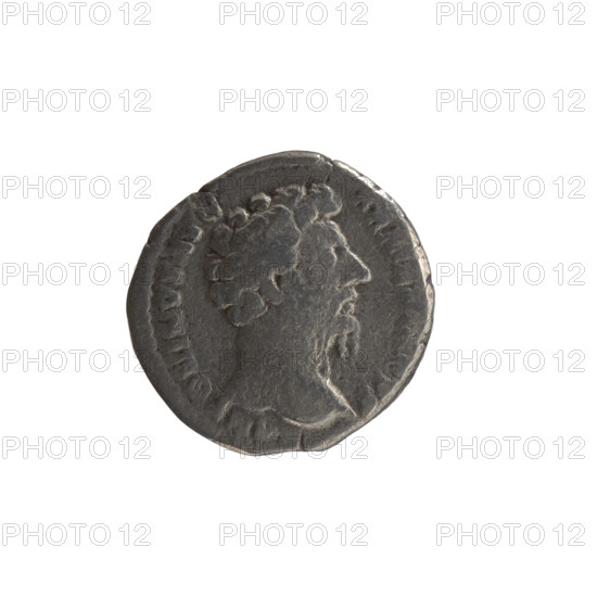 Denarius of Marcus Aurelius (121–180; Roman emperor 161–180). Obverse: head of Marcus Aurelius bare, right, legend ANTONINVS AVG - ARMEN, CVS. Reverse: personification of Armenia in a short robe, trousers and pointed cap, seated left, supporting her head with her right hand, left hand resting on a bow and quiver, with shield and standard (vexillum) in front; legend PM TR P XVIII IMP II COS III. Issuer: Marcus Aurelius; iconography: Armenia (personification), personifications, bows, quivers, shields, vexillum. Date: 163–164. Roman Empire; Rome. Coin (denarius). Diameter 17.0 mm, weight 2.90 g, axis 180°.