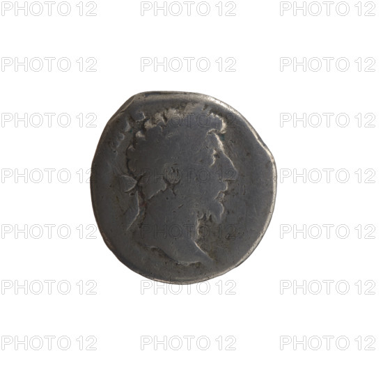 Denarius of Marcus Aurelius (121–180; Roman emperor 161–180). Obverse: Head of Marcus Aurelius with laurel wreath facing right, inscription AVG. Reverse: Personification of Armenia seated left, wearing a short robe, trousers, and a pointed cap; she supports her head with her right hand, rests her left on a bow and a quiver, with a shield and a standard (vexillum) before her; inscriptions RPX, COS III, in the episode ARMEN. Date: 163–164. Roman Empire (27 BC–476), Rome. Coin; silver, diameter 16–17 mm, weight 2.90 g, axis 180°.