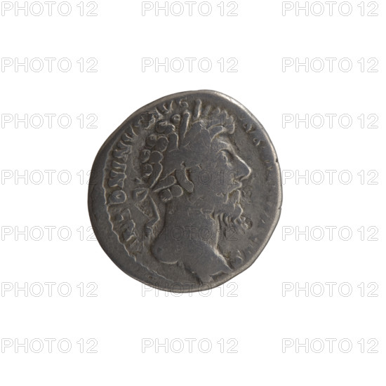Denarius, Marcus Aurelius (121–180; Roman emperor 161–180), issuer; obverse: head of Marcus Aurelius with laurel wreath facing right, inscription NTONINVS AVG - AR, CVS all around; reverse: personification of Armenia in a short robe, trousers and a pointed cap seated left, supporting her head with her right hand, resting her left hand on a bow and quiver, with a shield and a standard (vexillum) in front; inscriptions X, COS III, RMEN.; dated 163–164; Roman Empire (27 BC–476), Rome; coin; weight 3.00 g; diameter 16.5–17.0 mm; axis 15°.