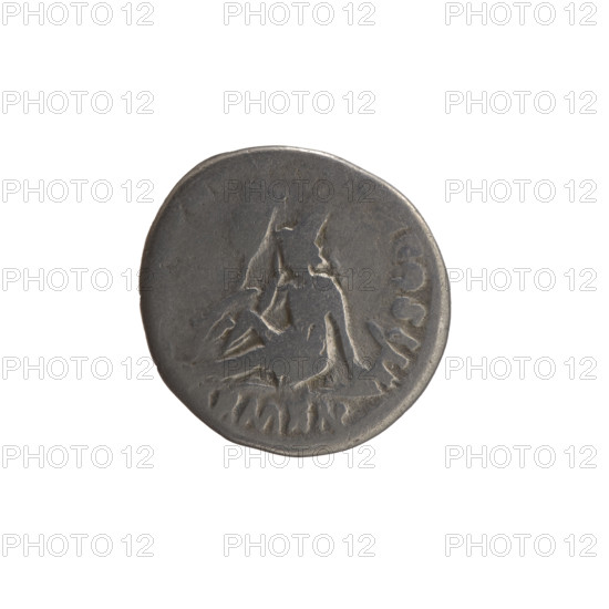 Denarius of Marcus Aurelius (121–180; Roman emperor 161–180). Obverse: Head of Marcus Aurelius with laurel wreath facing right, inscription NTONINVS AVG - AR, CVS. Reverse: Armenia personified wearing a short robe, trousers and a pointed cap, seated left; she supports her head with her right hand, rests her left on a bow and quiver, with a shield and a standard (vexillum) before her; inscription RMEN., X, COS III. Date: 163–164. Roman Empire (27 BC–476), Rome. Coin; diameter 16.5–17.0 mm, weight 3.00 g, axis 15°.