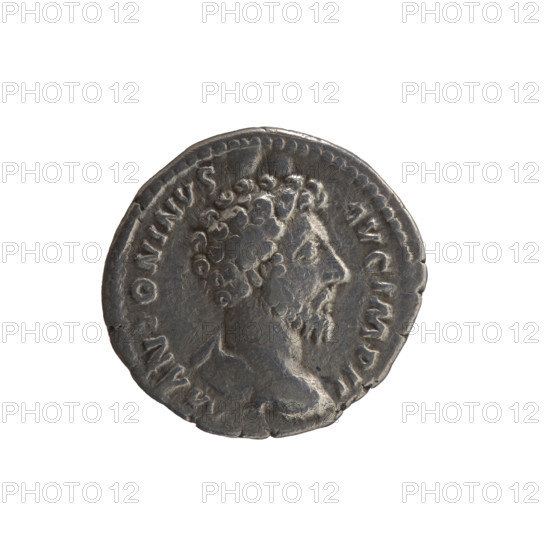 Denarius of Marcus Aurelius (121–180; Roman emperor 161–180). Obverse: Bust of Marcus Aurelius without a covering, in armor, facing right, inscription 'M ANTONINVS - AVG IMP II' around. Reverse: Minerva stands left, holds a branch in her right hand, supports a round shield with a spear in her left hand, inscription 'TR P XVIII - COS III' around. Date: 163–164. Roman Empire. Rome. Coin; weight 3.07 g; diameters 17.0 mm and 18.5 mm; axis 345°. Subjects/iconography: Roman deities, Minerva, branches, spears, shields; Marcus Aurelius - iconography.
